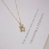 Wholesale of new copper-plated real gold three-dimensional sparkling diamond cartoon bear collarbone chain for women's Instagram trendy and cool hip-hop personality necklace details Picture